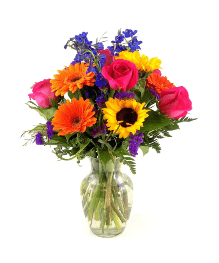 The Dazzler is a vibrant bouquet of gorgeous blooms that will deliver huge smiles when it arrives. This beautiful vase arrangement features favorites like roses, sunflowers and gerbera daisies and more along with greenery expertly arranged in a clear glass vase. Colors will vary upon availability, however the overall look will remain the same.